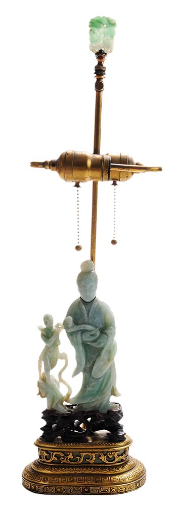 Carved Green Nephrite Jade Quanyin: and Phoenix Chinese, late 19th/early 20th century, standing figure in flowing gown with hair in bun, holding a lotus flower, beside a phoenix resting on a mound, 9-3/8 in., with finely carved reticula