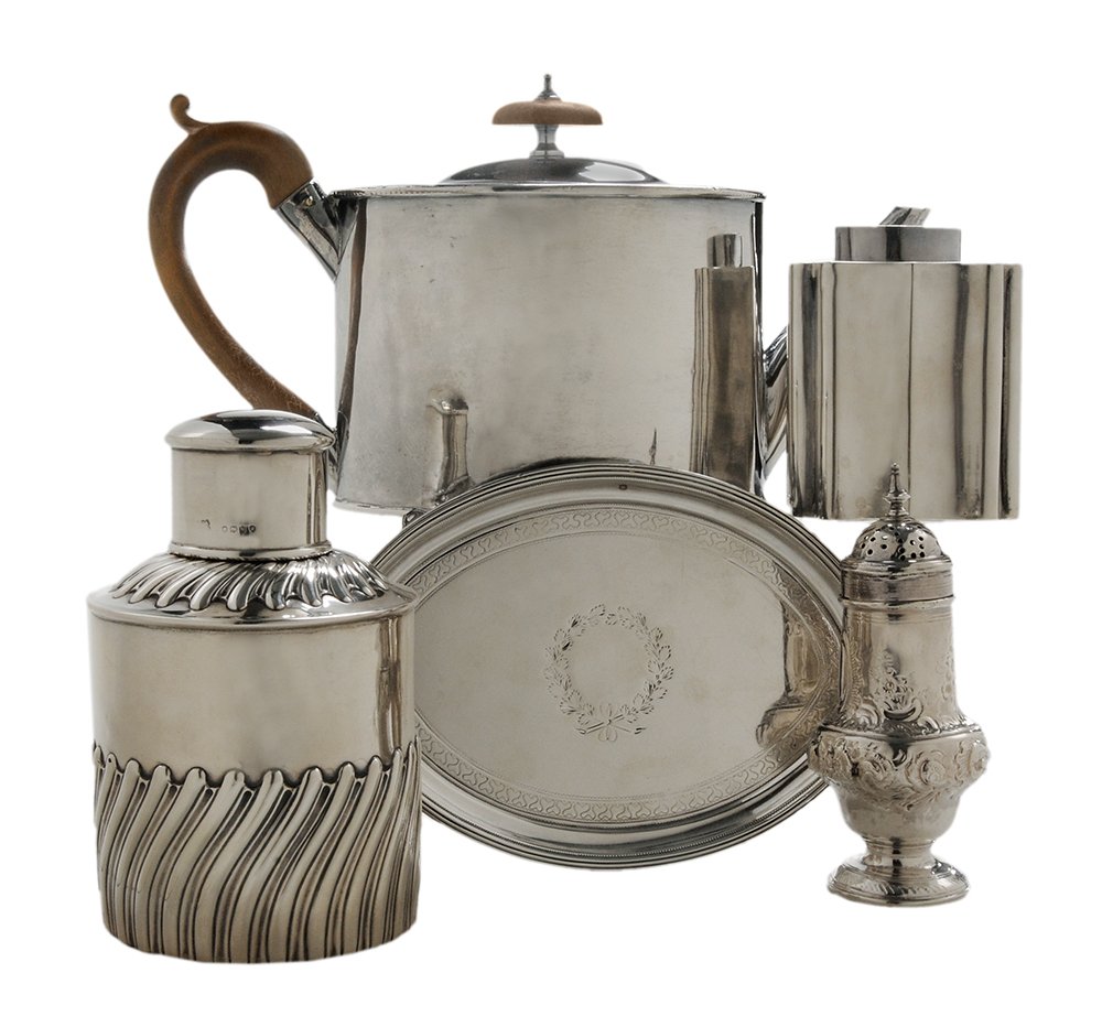 Five Pieces English Silver Holloware: including teapot, wooden handle and finial, marks for Daniel Smith and Robert Sharp, London, 1787, spout with dents; oval footed stand, marks for Henry Chawner, London, 1795; caster, marks for Jabez D