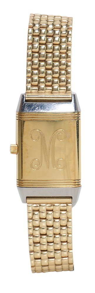 Jaeger Le Coultre "Reverso" Watch: dial marked "Jaeger Le-Coultre/ Reverso", engraved "M" verso of dial, stainless steel case marked "260508, 1770936", case not opened, 14 kt. gold mesh bracelet, 7 in. x 8.6 to 