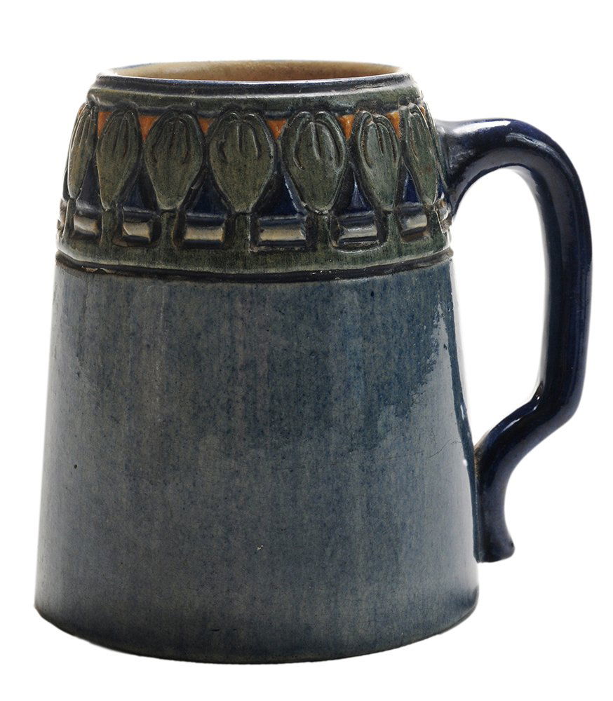 Newcomb Pottery Stein: (American, 1874-1950), impressed 1906 date code "BC31", rim with repeating flower bud border, applied loop handle, high-glazed blue/gray body, impressed mark, artist cipher for Henrietta David