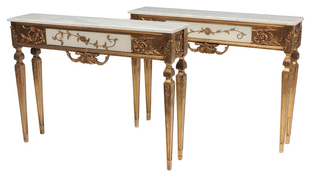 Pair Directoire Style Gilt and: Glass-Inset Marble-Top Pier Tables late 20th century, each with rectangular marble top over a decorated and gilt frame with central skirt tablet, white glass with gilt metal leaf and rosette appliqu&#