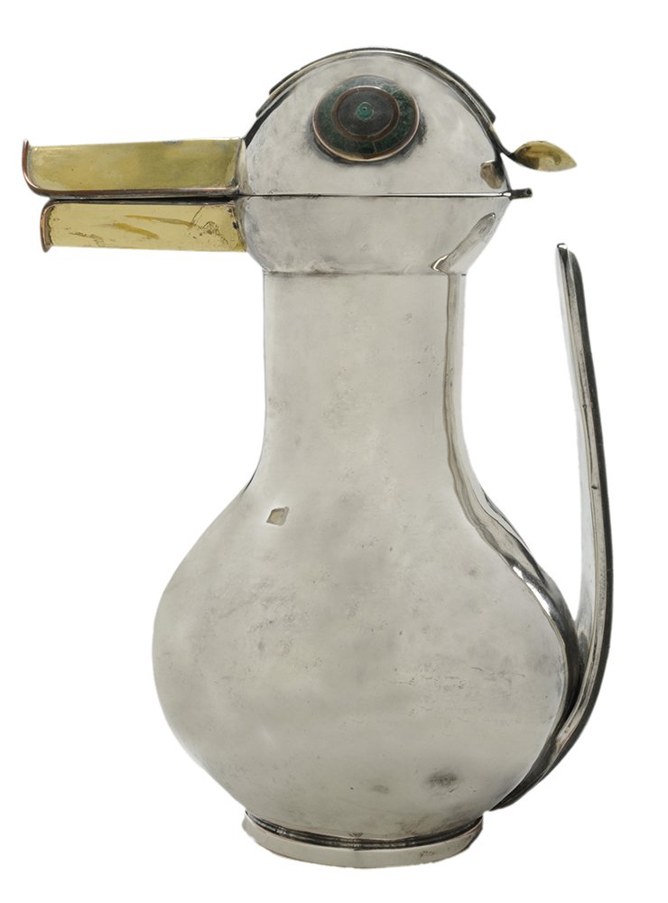 Los Castillo Silver-Plate Duck Pitcher: Mexican, 1939-1962, round base with duck-form top, brass spout/bill, green stone highlights, marks for Los Castilo, no monogram, 10-3/4 in., wear, light scratches, dents