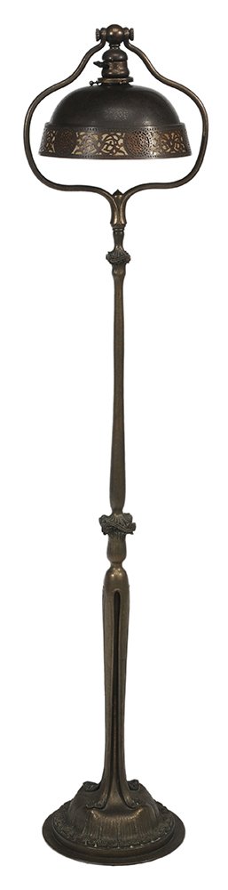 Tiffany Studios Gilt Bronze Floor Lamp: with Bronze Shade American, 20th century, dome-top bronze damascene unsigned shade with slag glass border band and numbered "85-1-42" on bottom rim of shade, gilt bronze base with graduated scrolling 
