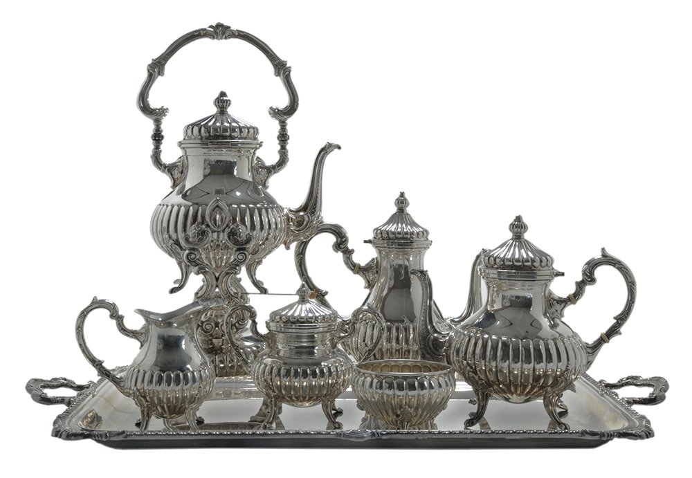 Peruvian Six-Piece Sterling Tea: Service and Tray 20th century, stopped reed pear-shaped bodies, scroll handles and feet, composite spacers, marks for Camusso, no monogram, 19 in. hot water kettle with matching coffeepot, teapot, cov