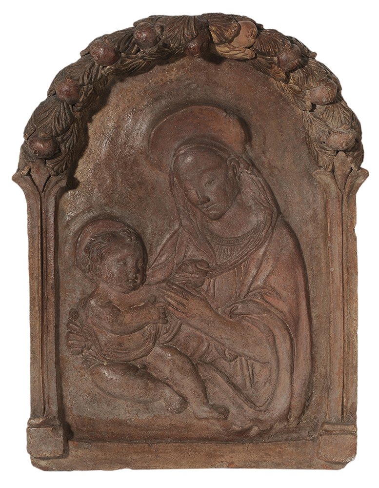 Manner of Francesco di Simone Ferrucci: (15th century or style) Madonna and Child, polychromed terracotta, 21-1/2 16-3/4 x 3-1/4 in., chips and minor losses, possible repair or firing crack lower right. Provenance: A New York Collection