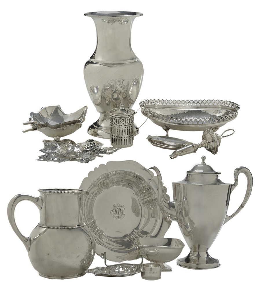 Sixteen Pieces Silver Hollowware: including two Cartier leaf dishes; Gorham bowl, "8135B"; Mexican sterling teapot, wooden spacers; Black, Starr & Frost sterling water pitcher, [numerous dents]; coin silver creamer; Portugal oval dish