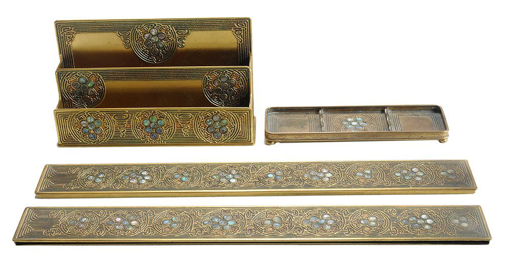 Tiffany Studios Partial Desk Set: American, early 20th century, abalone and gilt bronze, including pair blotter ends, 19-1/4 in., letter holder, 5-1/2 in., and pen tray, 8-3/4 in., each marked "TIFFANY STUDIOS/NEW YORK", shapes 1151,