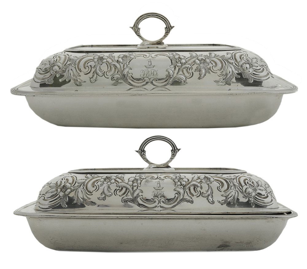 Pair of English Silver Entrée Servers: London, 1807, rounded rectangular form, reed borders, dome tops with scroll and floral decoration, unmarked detachable handles, matching marks, marks for William Bennett, family crest and monogram, .9