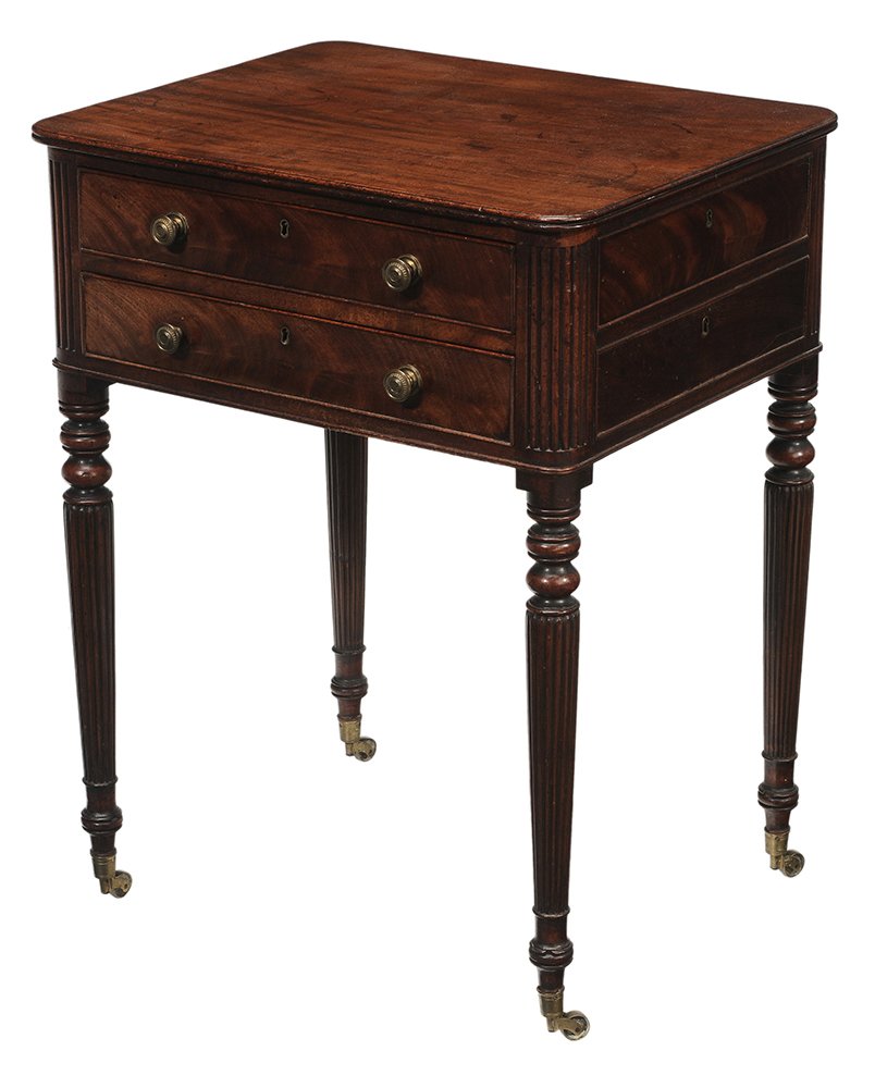 Sheraton Figured Mahogany Two-: Drawer Lady's Work Table British, early 19th century, figured mahogany throughout, dovetailed drawers with mahogany linings, case sides and back each with two false drawers, reeded legs and brass cast