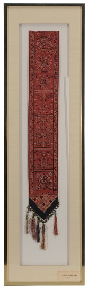 Embroidered Sash: Taiwan, mid 19th century, intricate embroidery in black, grey, gold, and cream on red cloth, divided into seven squares each with a different image, comes to a black V at bottom with beading and tasse