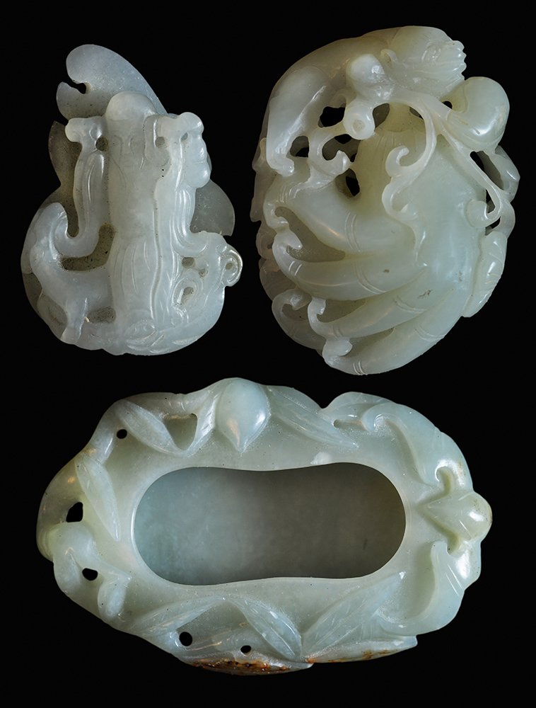 Two Finely Carved White and Celadon: Jade Toggles, Oval Dish Chinese, late 19th/early 20th century: white jade toggle carved as standing elder, 2-1/4 in., [possible abrasion to edge;] pale gray to light celadon jade toggle with foo lion 