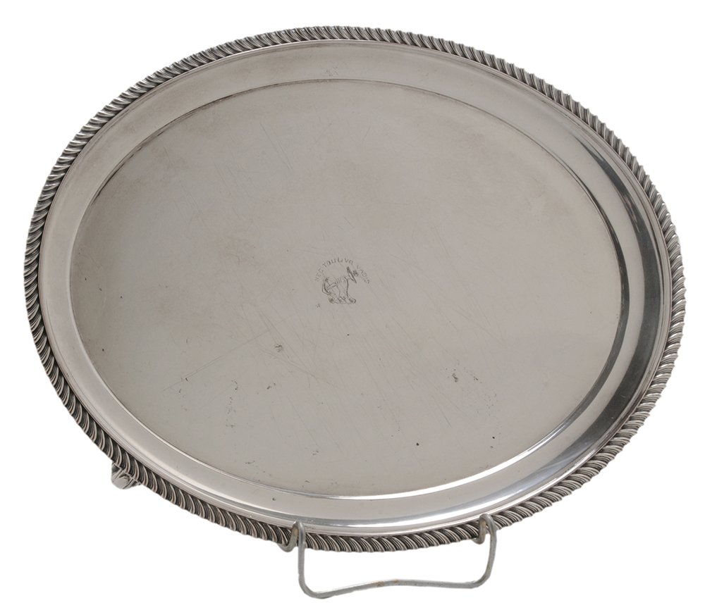 Matthew Boulton Old Sheffield Plate: Tray English, late 18th/early 19th century, oval with gadroon border, scroll feet, double star mark for Matthew Boulton, central heraldic device, 13-1/4 in., floor with scratches, loss to plate. Prove
