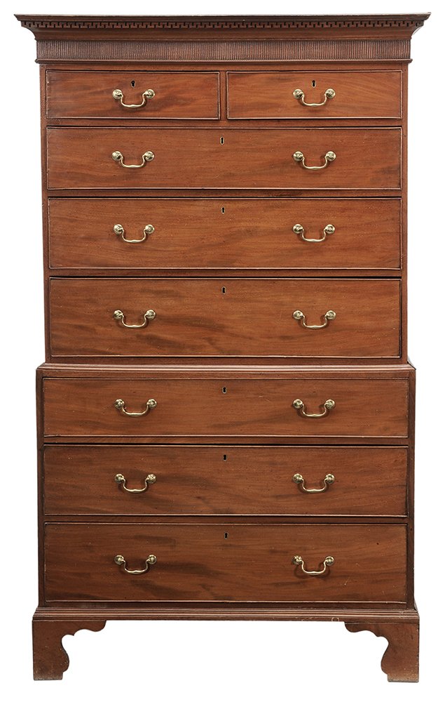 George III Figured Mahogany Chest on: Chest British, late 18th/early 19th century, two-case construction, dovetailed drawers with oak linings, Greek key and reeded cornice, straight bracket feet, probably original brass bail handles, 73-1