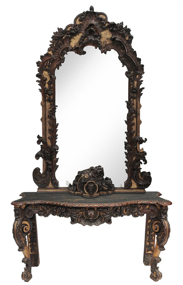 Rustic Chippendale Style Carved,: Parcel Gilt and Faux-Painted Pier Mirror and Table British, 19th century, oak throughout, elaborately carved mirror set with leaf, floral and mask-carved applique, conforming table with mask-carved sk