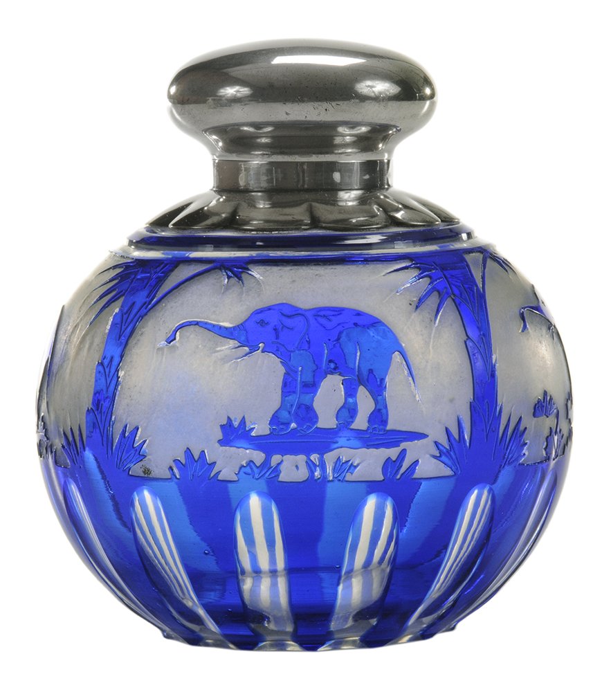 Very Rare Thomas Webb & Sons(?) Cameo: Glass Cologne Bottle English, 1891-2, cobalt over colorless crystal, cut, etched and frosted, features panels of elephants in jungle on frosted ground, fine English silver mount with gadrooned collar