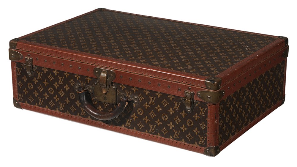 Louis Vuitton Leather and Brass-: Mounted Suitcase (French, 20th century), finely cast stamped brass hardware at corners and latch, looped leather handle, printed top opening to lift-out tray with straps and lifting handle, serial num