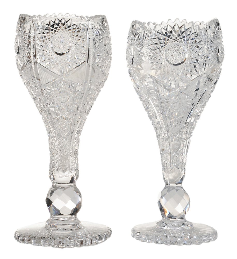 Two Similar Brilliant-Cut Glass Vases: 20th century, each with a broad mitered foot, faceted knob, overall tulip form with hobnail, zipper and cross-hatched motifs, unsigned, 13-3/4 in. and 14-1/4 in. a few nicks to points around top rim a