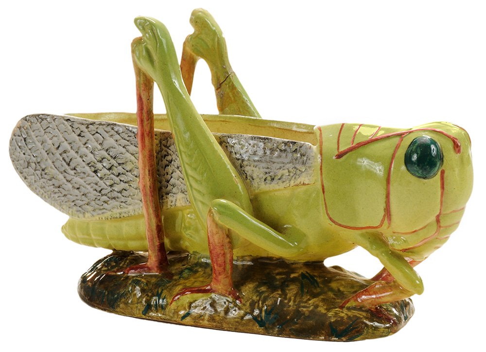 Majolica Jerome Massier Fils: Grasshopper Figural Planter French, early 20th century, figural grasshopper planter with open back, raised on oval platform base, impressed "Jerome Massier Fils, Vallauris, France" with partial label,