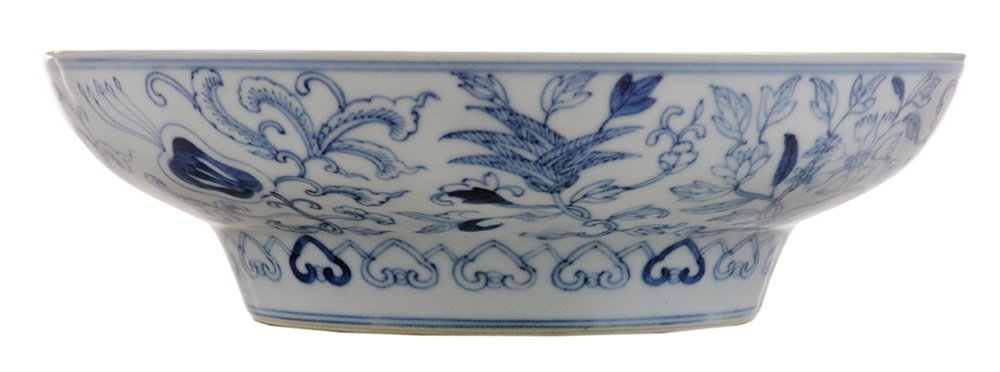 Guangxu Blue and White Porcelain Ogee: Bowl Chinese, late 19th century, possibly imperial, center with floral medallion with overlapping petals encircled by four peaches and four stylized lotus blossom scrolls, well with eight Buddhist emb