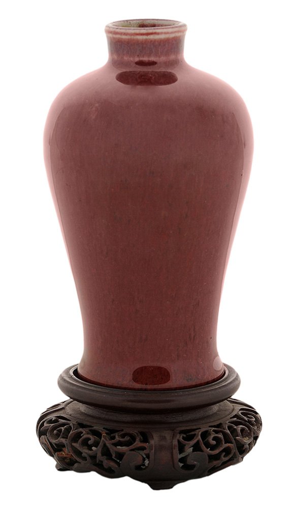 Finely Modeled Meiping [Sang de Boeuf]: Vase Chinese, probably 18th century, finely glazed Meiping vase, unmarked and unglazed base, 5-1/4 in., 6-1/2 in. with finely carved hardwood stand good condition. Notes: The Fine Arts Company of Phil