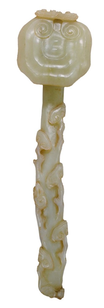 Finely Carved White to Celadon: Hardstone Scepter Chinese, late 19th/early 20th century, scepter carved in naturalistic form with seven [ruyi] carved on shaped handle and four on reverse of handle, 2-1/8 x 16-1/4 x 4-1/4 in., on sil