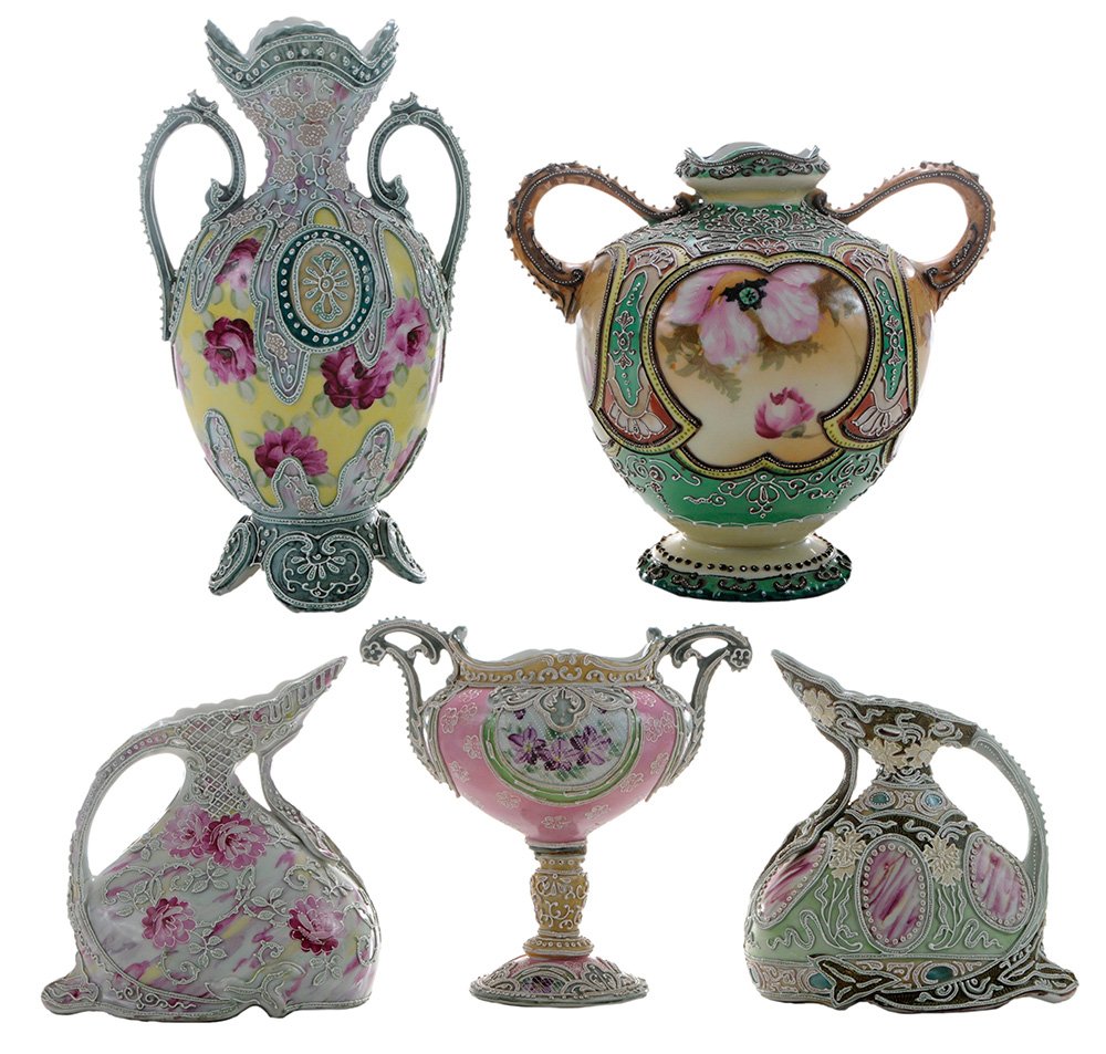 Five Nippon Articles with Moriage: Japan, 20th century, molded porcelain painted with flowers and decorative patterns overlaid with white raised pastework (moriage), two ewers, two vases, and one urn, no marks, 7-1/4 in. to 9 in.,