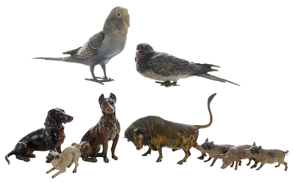 Seven Austrian Cold-Painted Bronze: Figures late 19th/early 20th century, three pigs marked "Geschutzt", attributed to Franz Bergman, 3-7/8 in., [minor surface wear;] bull with bone horns, unmarked, 3-3/4 in.; seated Doberman, unmarked,