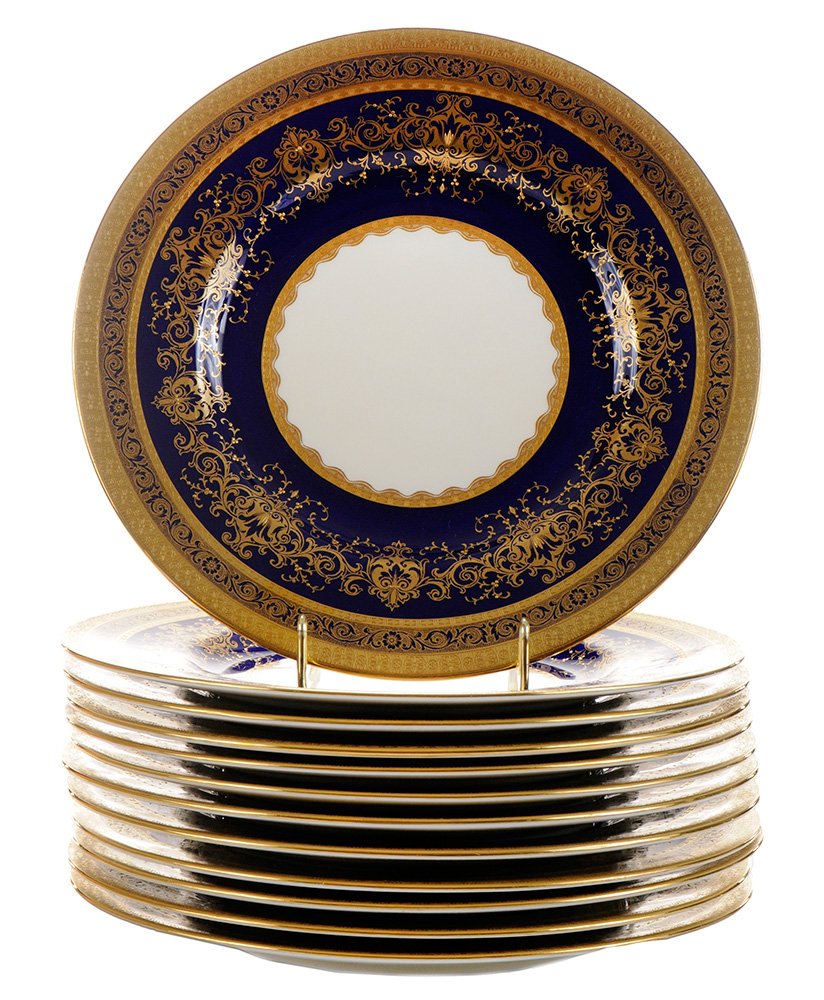 Set of 12 Minton Service Plates: English, early 20th century, wide border of deep cobalt-blue ground with raised gold, gold print, and gold etch in [Beaux-Arts] style, pattern "ASH4230", "MINTONS" with globe and crown, made for sale 