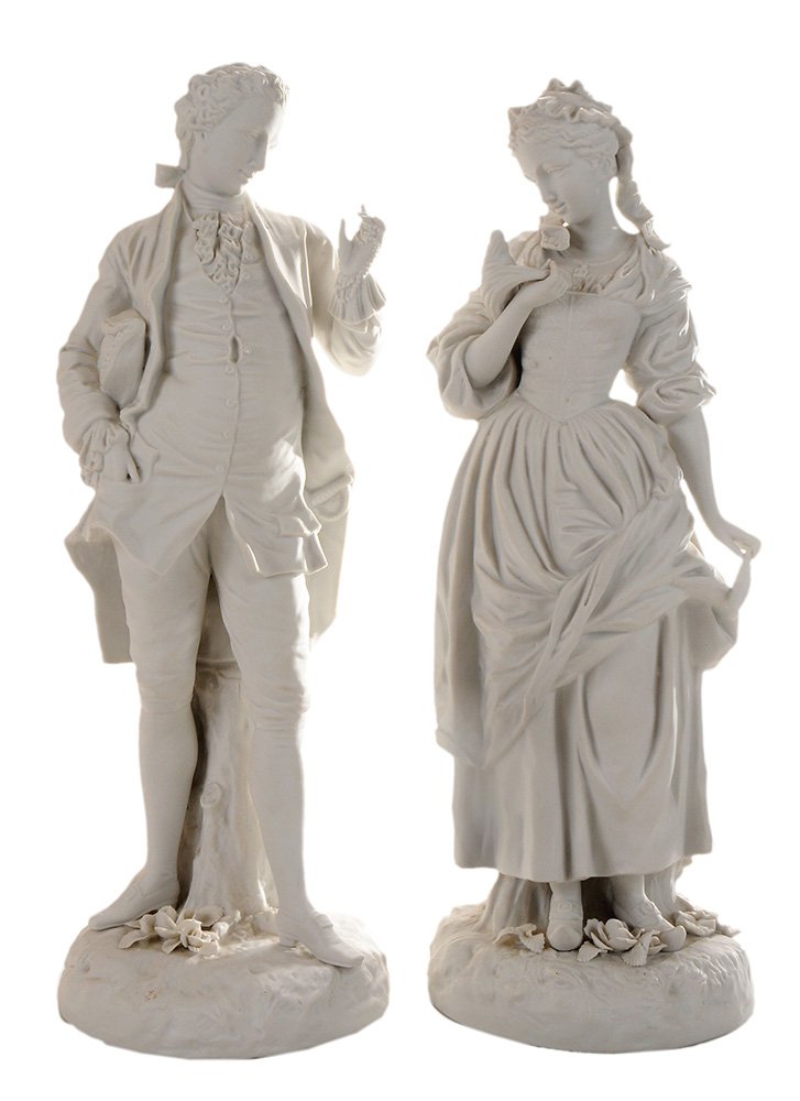 Pair of Parian Porcelain Figures of: Man and Woman in 18th-Century Costume England, mid 19th century, he holding a tri-corn hat and beads, she holding a skein of yarn and a bobbin, no marks, 19-1/2 in. and 20 in.,