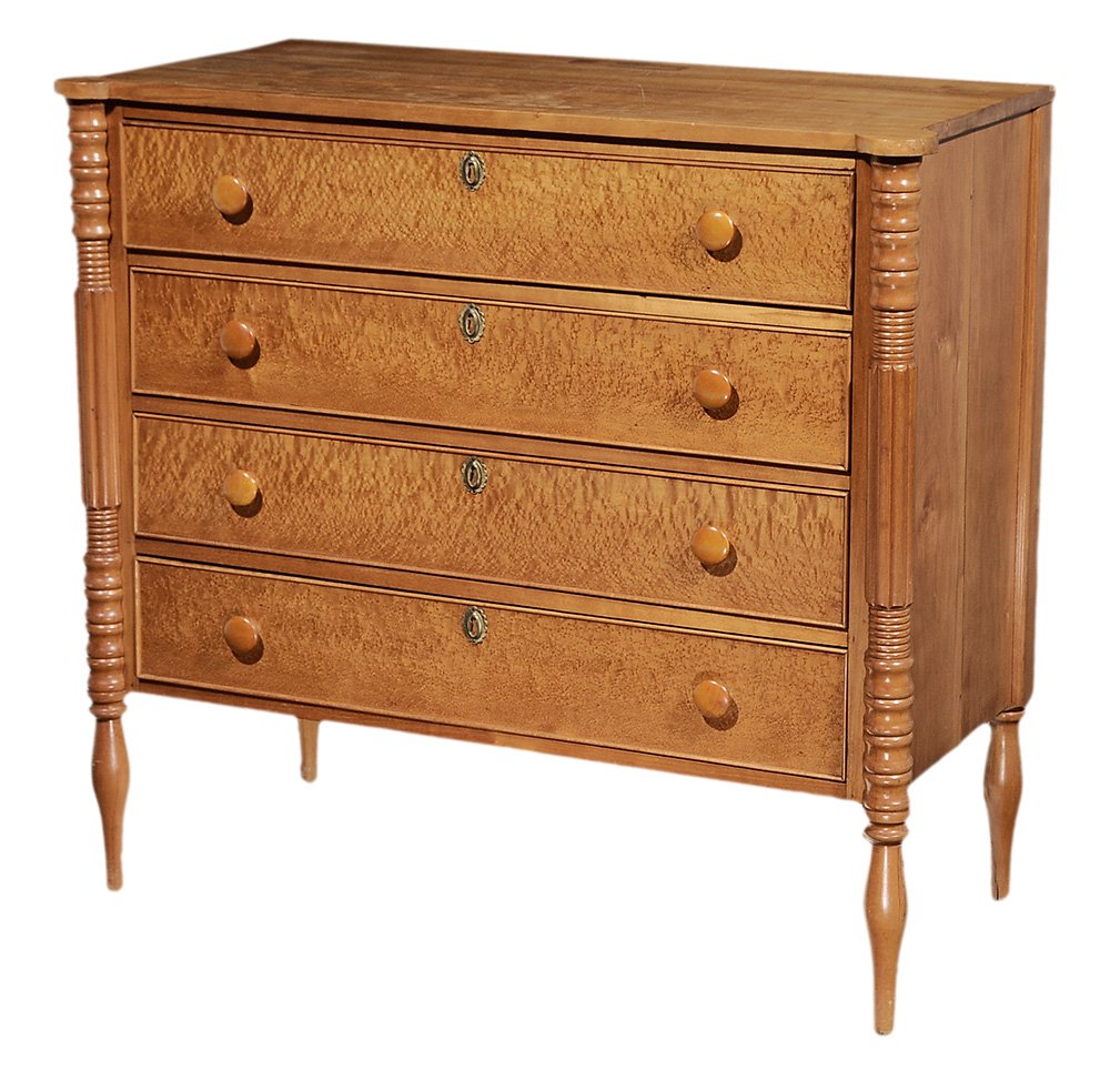 American Sheraton Bird's-Eye Maple: Chest of Drawers New England, early 19th century, four dovetailed drawers with white pine secondary, turned and reeded front legs, 39-1/4 x 42-1/2 x 20-3/4 in.