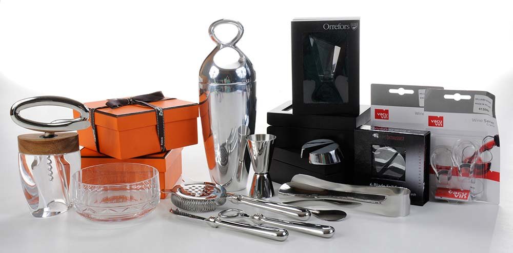 Large Assortment Bar Accessories: pair Hermes Iskender cut crystal wine coasters, 4-1/2 in., in original boxes; three cased Orrefors crystal bottle stoppers, 4 in.; two six-plate foil cutters for wine bottles; Infinity brushed chrome