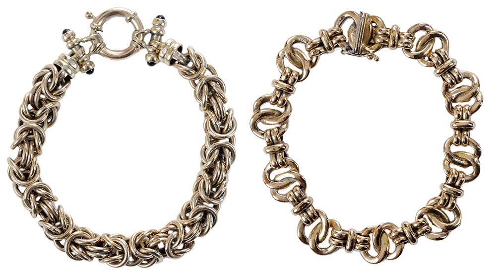 Two 14 Karat Gold Chain Bracelets: one 8-1/2 in. hollow gold "Byzantine" link bracelet, with four black onyx cabochons, 31.9 grams; one 7-1/2 in. hollow fancy link and bar bracelet, 15.1 grams. Condition: wear and light tarnish on both