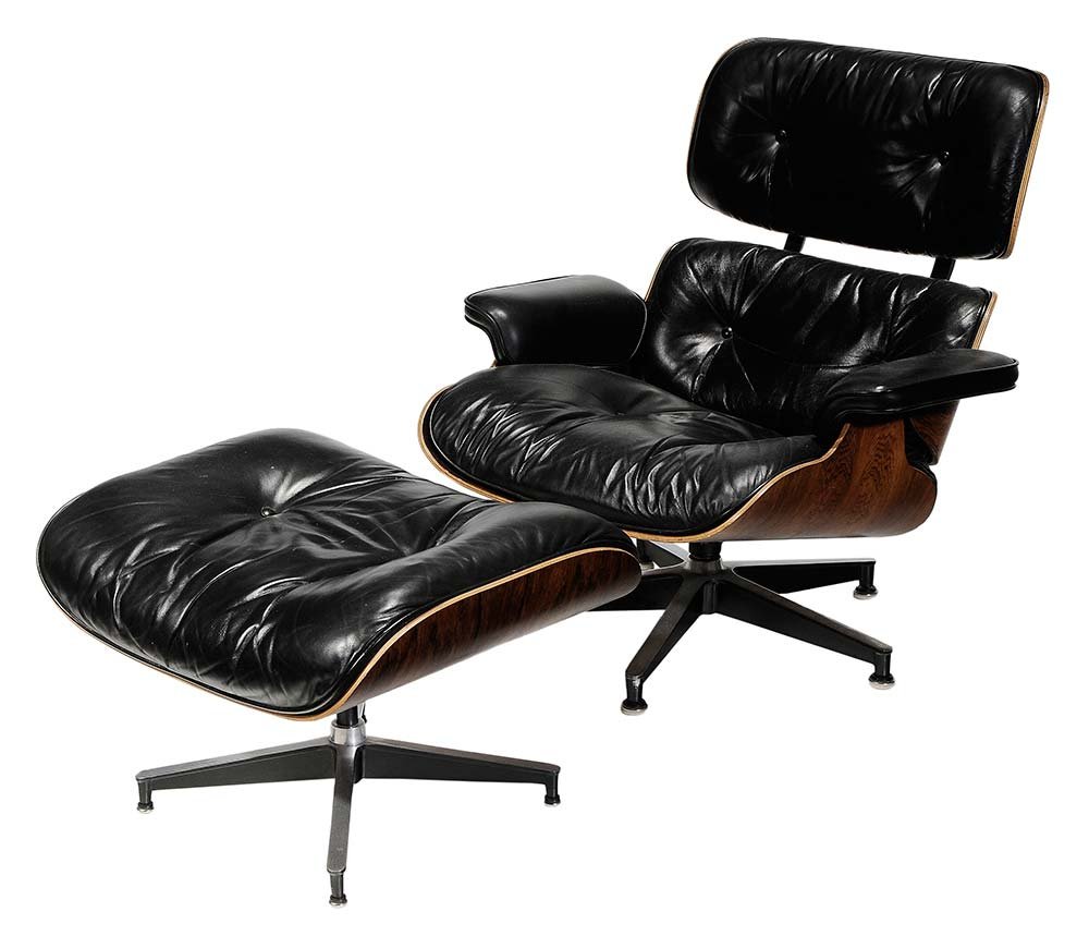 Vintage Herman Miller Eames Chair and: Ottoman probably circa 1960s, rosewood veneers and black leather upholstery, the chair set on a swiveling base, 33 in., with matching ottoman, 17 in., both pieces with Herman Miller label. Condition: 