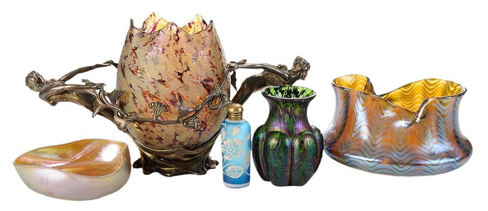 Five Iridescent Art Glass Articles: English, Continental and American, late 19th/early 20th century, including a Loetz iridescent bowl with free-form rim, etched "Loetz/Austria" on bottom, 3-3/4 in., [good condition]; Steuben gold Auren