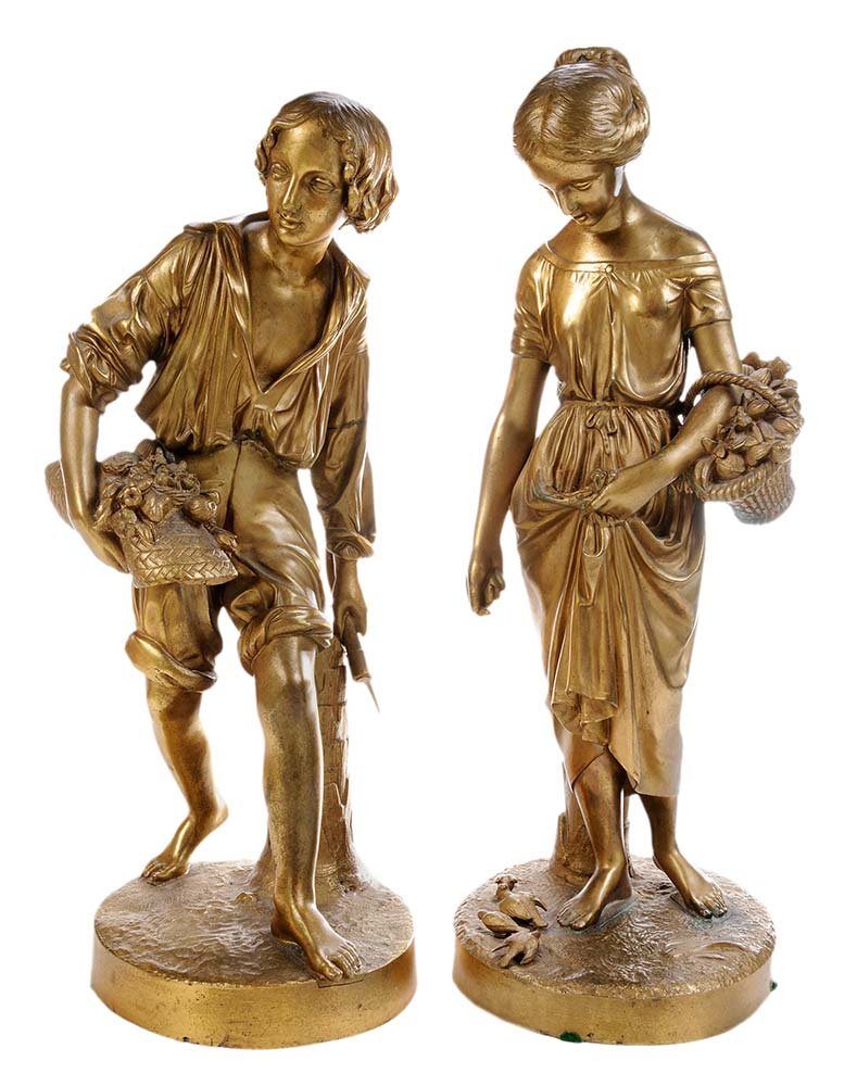 After Charles Cumberworth: (British, 1811-1852) pair 20th century gilt bronze figures of basket carriers standing on a oval base with stylized tree stump, one signed on base "C Cumberworth", 17-1/2 in. and 17 in.. Condition: so
