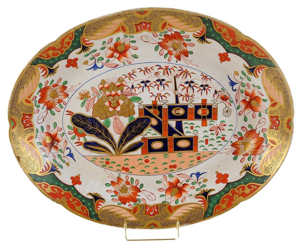 Finely Gilt and Enamel-Decorated Spode: Junket Dish English, early 19th century, pattern No. 967, modeled after the Japanese Kakiemon Imari pattern in iron red, green and cobalt enamels, scalloped rim, marked "Spode 967", 2-1/8 x 17-5/8 x 1