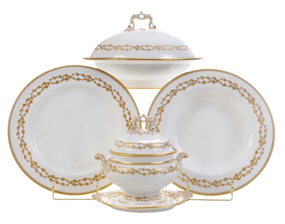 Copeland's Bone China Partial Dinner: Service English, made for T. Goode Company, London, early 20th century, gold wreath border with red berries, including ten dinner plates 10 in.; 12 open soup plates 10 in.; two round covered footed di