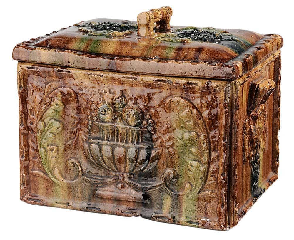 Large Scottish Ceramic Bread Box: 19th century, molded rectangular box of yellow ware with grapes and urns in relief with brown and green variegated glazes overall, no marks, 13-1/2 x 16-1/2 in.. Condition: large chip on one corner of