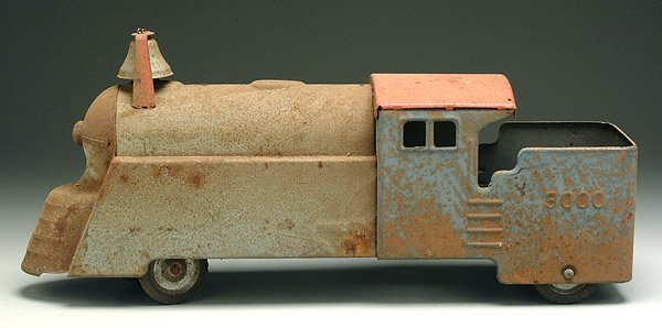 Steel locomotive riding toy,: Steel locomotive riding toy, marked "Marx," scattered rust, possibly lacking some parts, 24"