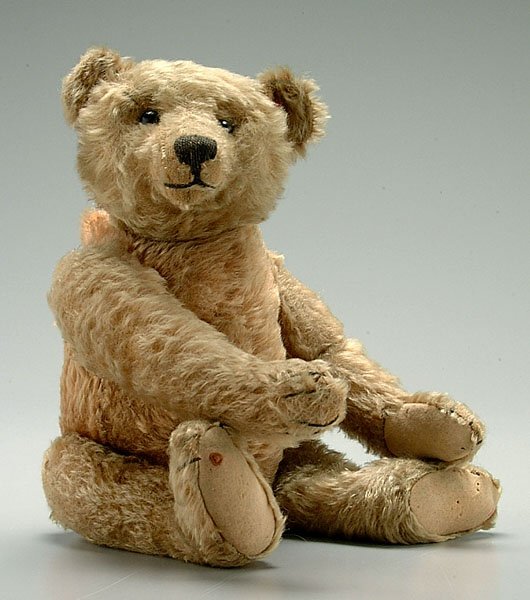 Button eye teddy bear,