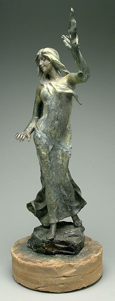 Spelterware sculpture of woman,