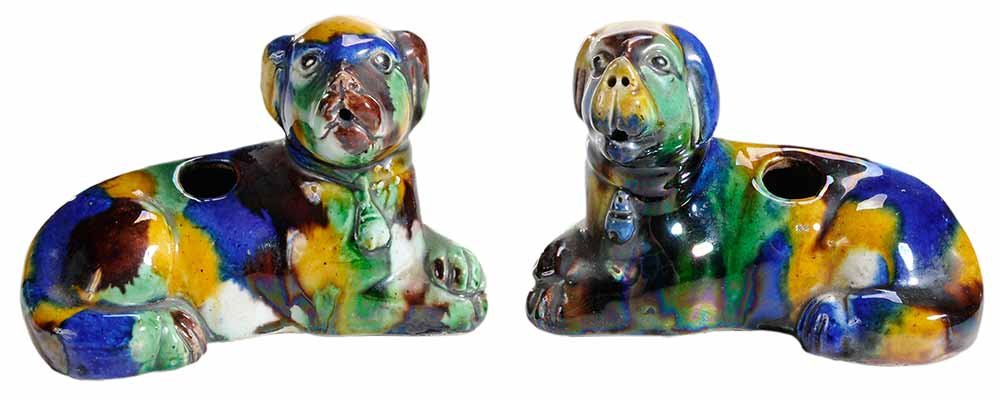 Pair of Chinese Dog Form Water: Droppers pottery recumbent dog with multi colored glaze of blue, green, and amber, unglazed bases, unmarked, 3 x 4 x 2-1/8 in.. Provenance: Property of A Gentleman