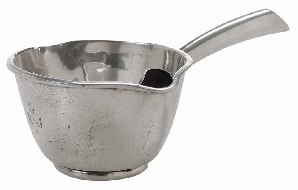 Mexican Sterling Gravy Separator: Mexican, 20th century, saucepan form, Eagle 1 mark, 13.95 oz. T., 3-1/2 x 8-3/4 x 5-3/4 in.,. Provenance: A Park Avenue, New York Collection