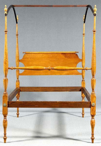 Federal tiger maple four-poster bed,: highly figured maple with ash or chestnut rails, finely turned urn-and-baluster posts, New England, 19th century, 77 x 50 x 77-1/2 in. Refinished, turned finials later, expected wear and surface flaws