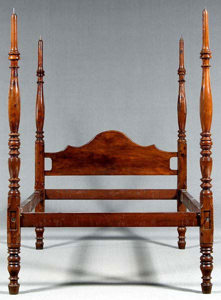 Southern Federal four-poster bed,: cherry, red cedar(?) and mahogany, foot posts ring and urn-turned, head posts baluster and ring-turned with figured mahogany arched headboard, 85 x 60-1/4 x 83 in. Shrinkage cracks and scattered patch