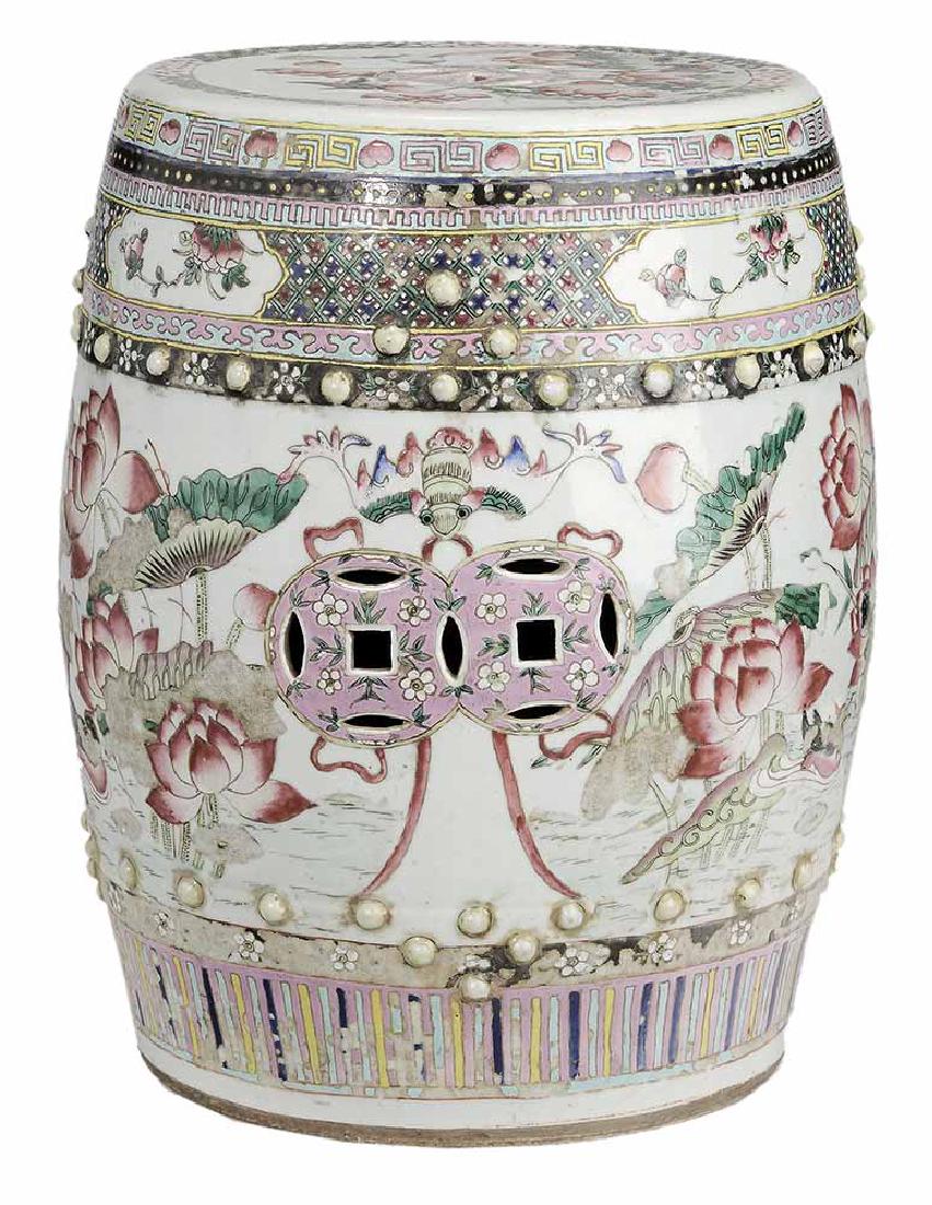 Famille Rose Porcelain Garden Seat: Chinese, late 19th/early 20th century, elaborately decorated top and sides, fruit and flowers between geometric, Greek key and peony bands, top and sides pierced with cutout Buddhist symbol handles, 1