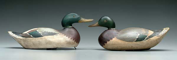 Two Mason mallard drake decoys: one premier grade, 17 in.; one from Joe Lewark's rig branded "JL", 15-1/4 in. Both with restored paint, minor separations and losses. Provenance: Joe Lewark; Bob Timberlake Collection.