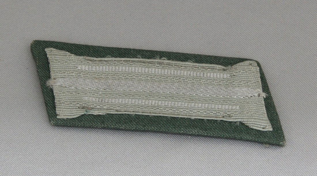 Collar Insignia: Green back, silver fabric detail, solid contstruction.