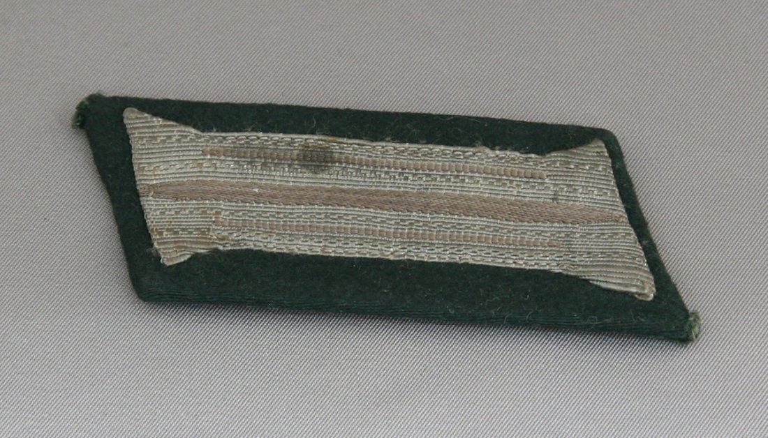 Collar Insignia: Black with grey emboridery.