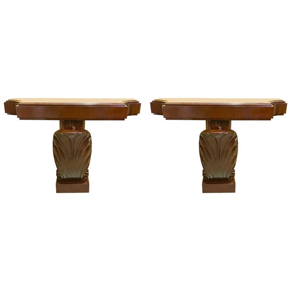 Pair of Grosfeld House Mahogany Shell Motif Consoles: Pair of Grosfeld House Mahogany Shell Motif Consoles Measures: H 36 in. x W 42 in. x D 14 in.